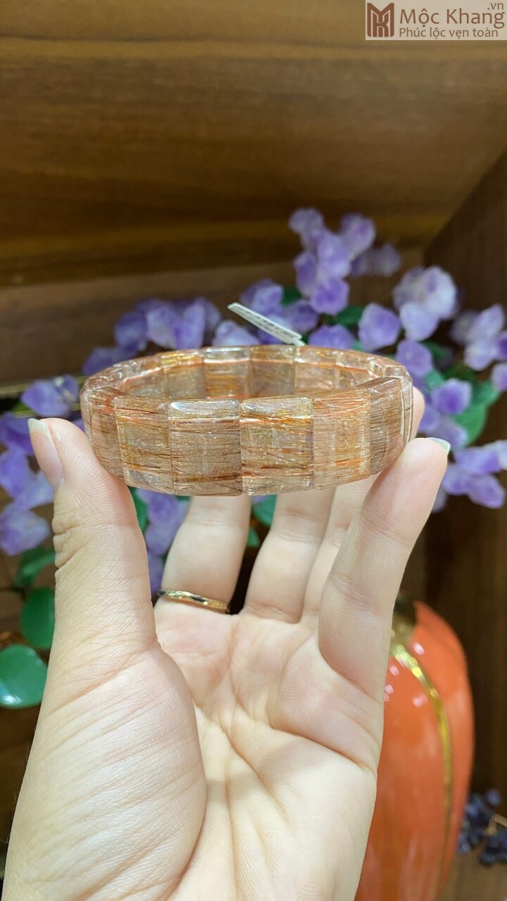 vong-tay-thach-anh-toc-vang-dong-size-18mm-2.jpg vong tay thach anh toc vang dong size 18mm 2