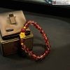 Vong Tay Thach Anh Toc Do Mix Charm Vang 8 11