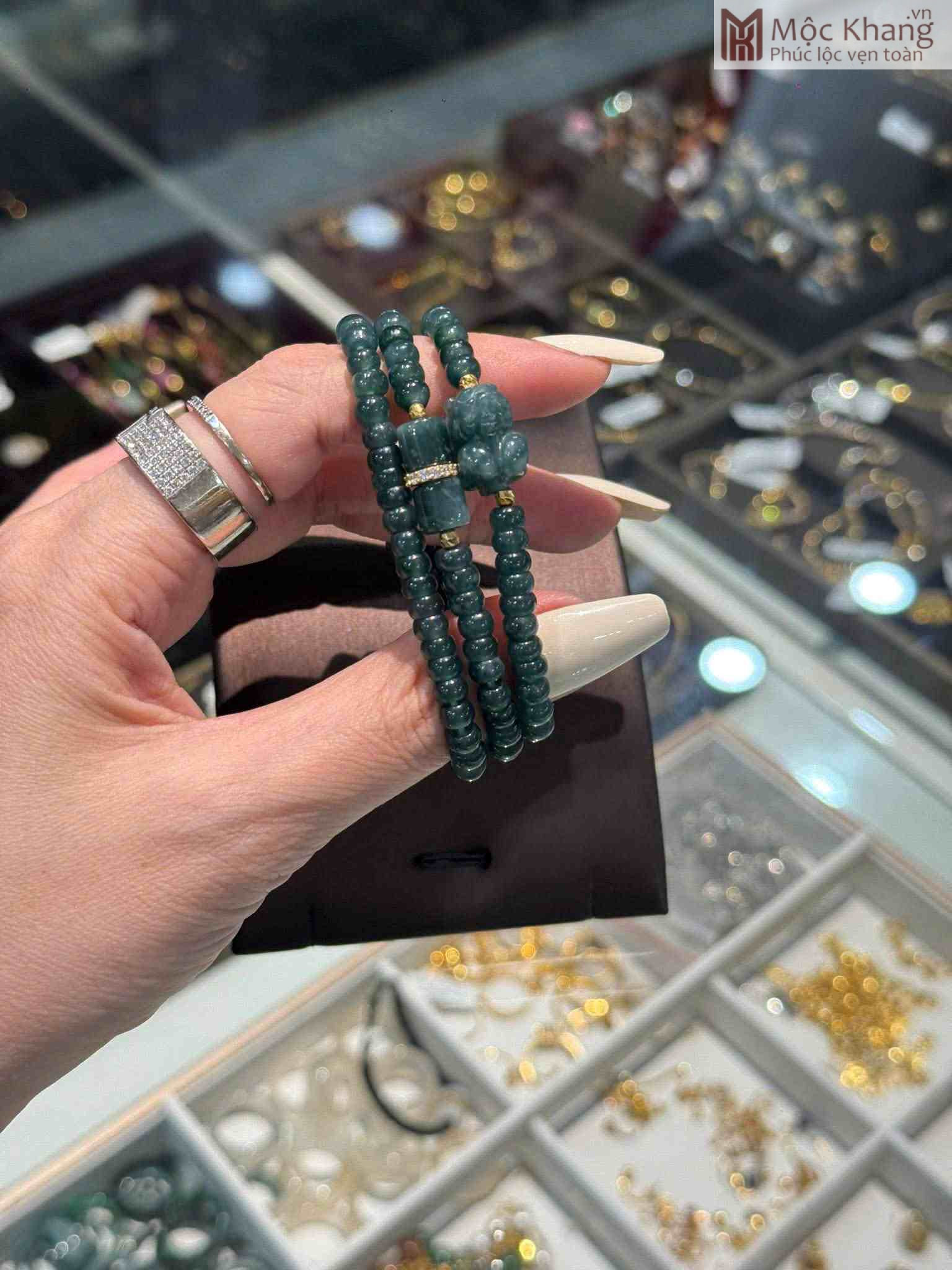 Chuỗi Lam Ngọc Bánh Xe Phối Charm Vàng (1)_1 Chuỗi Lam Ngọc Bánh Xe Phối Charm Vàng