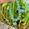 vong-lam-ngoc-mix-charm-hoa-sen-hat-99mm