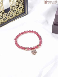 Vòng Thạch Anh Dâu Hồng Mix Charm Titan
