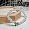 chuoi-bach-ngoc-mix-charm-bac-hat-74mm