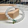 chuoi-bach-ngoc-mix-charm-bac-hat-74mm