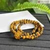 chuoi-mat-ho-nau-mix-charm-sen-hat-6mm
