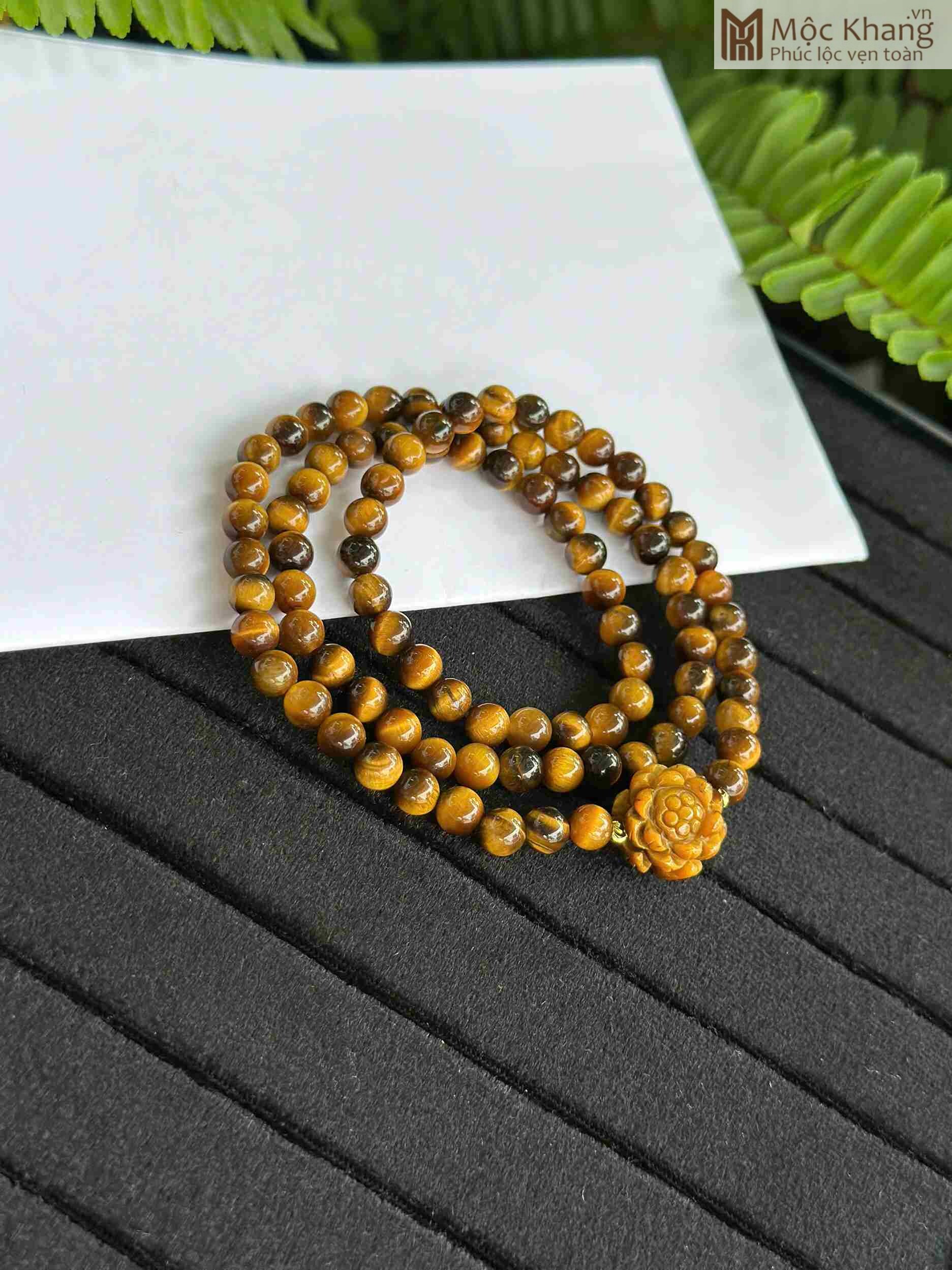 chuoi-mat-ho-nau-mix-charm-sen-hat-6mm (3) chuoi-mat-ho-nau-mix-charm-sen-hat-6mm