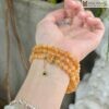chuoi-ngoc-huyet-uyen-uong-mix-charm-bac-hat-56mm