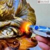 Quả đào Tiên gỗ hoá thạch đỏ, vàng chế tác thủ công, thích hợp trưng bày phong thuỷ Kích thước: Cao 30cm rộng 17cm nặng 5,7kg luôn đế
