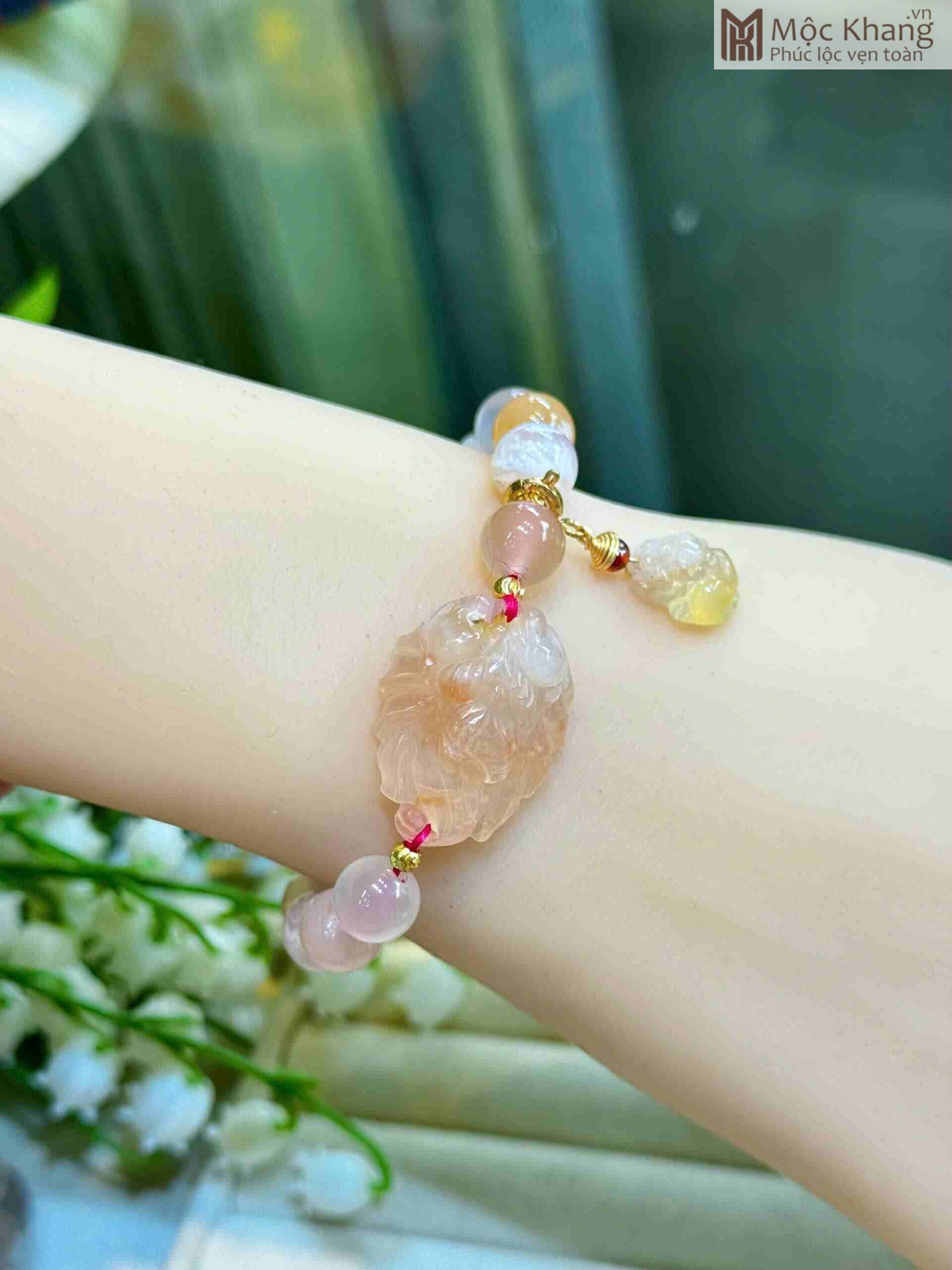 vong-tay-ho-ly-ma-nao-hoa-dao-mix-charm-hat-7mm (2) vong-tay-ho-ly-ma-nao-hoa-dao-mix-charm-hat-7mm