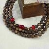 chuoi-108-hat-tram-ky-hai-nam-mix-charm-6mm