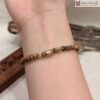 vong-tay-tram-huong-toc-mix-charm-hat-4mm